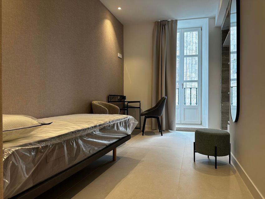 Imagen Dormitorio de habitación en Plaza da Universidade